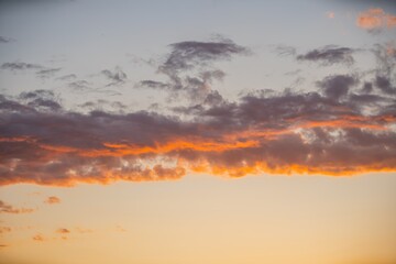 Vibrant sunset sky with colorful clouds creating a breathtaking evening display in a tranquil setting