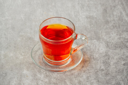 Black tea in a glass cup also locally called kattan chai, Sulaimani tea, Kerala Kattan Chaya, Malabar spiced tea.