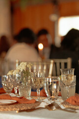wedding reception dinner with wine glasses on the table