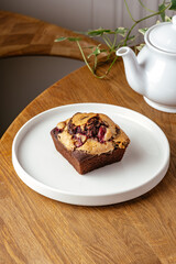 chocolate cupcake with filling on a plate