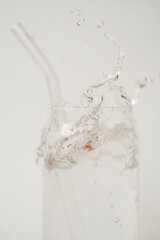 Water splashing from clear glass