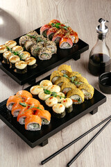 set of sushi with soy sauce