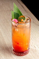 alcoholic cocktail with berries and ice