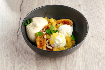 ice cream with caramelized banana and mango