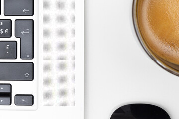 Minimalist Close-Up of Keyboard, Coffee, and Mouse