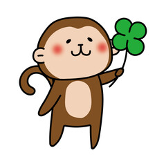 四つ葉のクローバーを持っている猿