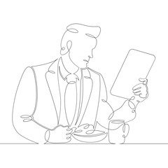 A man in a suit businessman at breakfast meal reads the news in the tablet. One continuous drawing line, logo single hand drawn art doodle isolated minimal illustration.