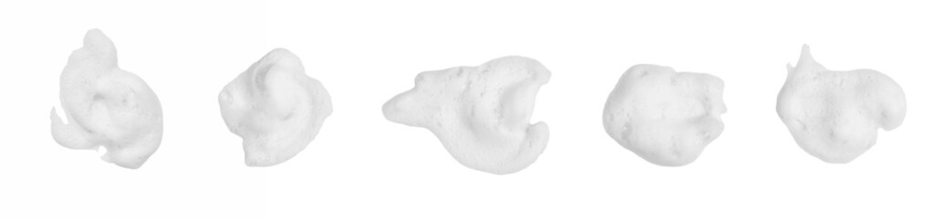 Isolated on a white background, a heap of foamy, soapy suds, created by shampoo and body wash, forms a thick, fluffy texture in the shape of bubbles, their abstract pattern and transparent surface