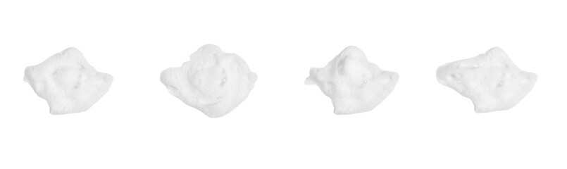 Isolated on a white background, a heap of foamy, soapy suds, created by shampoo and body wash, forms a thick, fluffy texture in the shape of bubbles, their abstract pattern and transparent surface