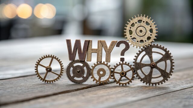 5 WHY analysis concept, Rustic gears with the word WHY displayed creatively