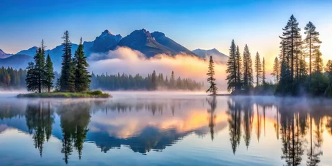 Printed kitchen splashbacks Serene Sunrise Over Misty Mountain Lake with Island Trees Reflected in Calm Water