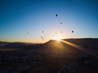 9Balloons lifted into the air in Cappadocia. Entertainment and tourist attraction. A spectacular sight