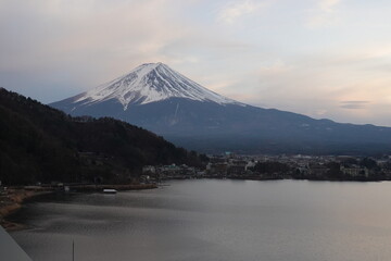 A peaceful evening at Lake Kawaguchi reveals Mount Fuji’s majestic form after sunset. The tranquil lake reflects the colorful sky, completing a perfect portrait of Japanese natural beauty.