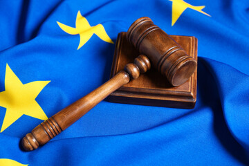 Judge's gavel on flag of European Union, closeup
