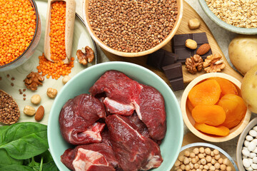 Different products rich in iron on table, flat lay. Diet plan for anemia