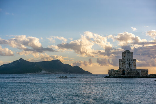 Bourtzi Methoni castle at sunset in the sea of Greece