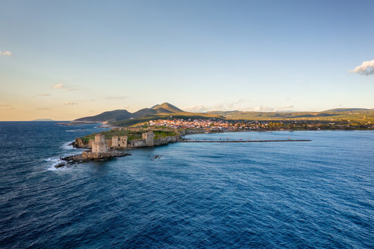 Bourtzi Methoni castle drone aerial view at sunset in Greece