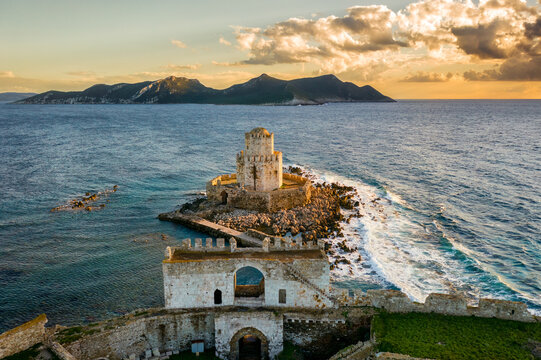 Bourtzi Methoni castle drone aerial view at sunset in Greece