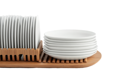 Stack of clean white ceramic plates drying on a bamboo rack in a kitchen. transparent background