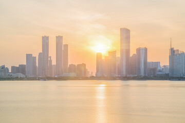 Obraz premium The urban skyline and Ganjiang River scenery of Nanchang City, Jiangxi Province, China on April 1, 2024