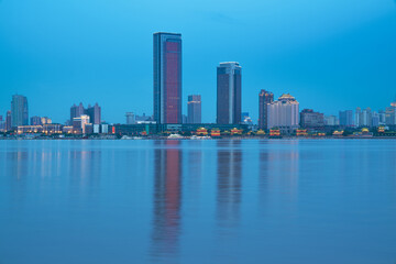 Fototapeta premium The urban skyline and Ganjiang River scenery of Nanchang City, Jiangxi Province, China on April 1, 2024