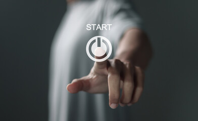 Business Startup concept, Person makes important decisions by pressing the start button on virtual...