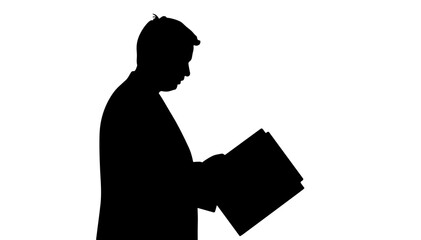 Silhouette of a man reading a book against a white background