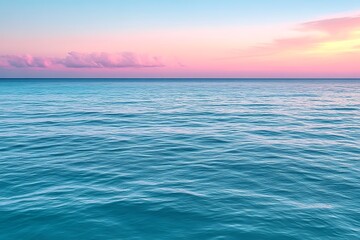 Fototapeta premium Serene ocean sunset with pink clouds.