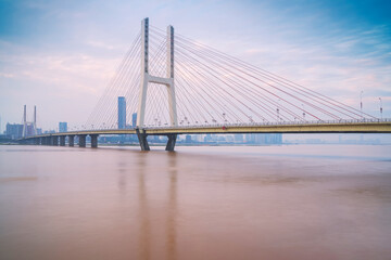 The urban skyline, Bayi Bridge, and Ganjiang River scenery of Nanchang City, Jiangxi Province, China on April 1, 2024
