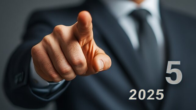 A businessman pointing at a virtual target with text 2025, 2025 business