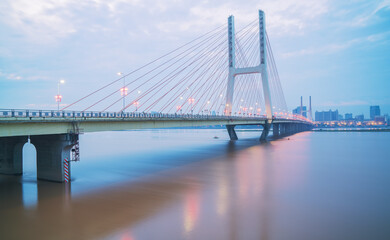 The urban skyline, Bayi Bridge, and Ganjiang River scenery of Nanchang City, Jiangxi Province, China on April 1, 2024