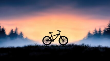 Obraz premium Mountain bike sunset silhouette, forest background, adventure, travel poster