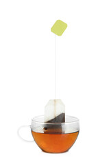 Cup with tea bag isolated on white