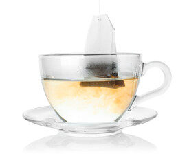 Cup with teabag isolated on white. Brewing aromatic tea