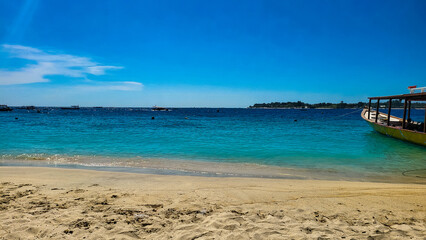 Tropical Beach Meets Azure Ocean: Boat Trip Paradise with White Sand, Calm Water, Sunny Sky, and Island Views. Explore with Summer Vacation Vibes!