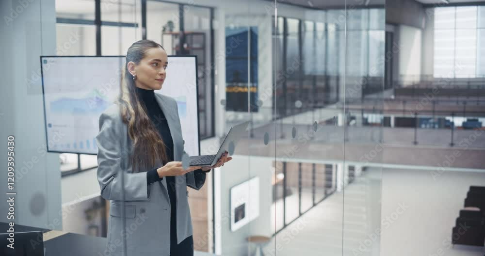 Aufkleber confident caucasian woman working on laptop computer in a bright and modern office. young manager in