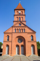 Front of the Holy Trinity church on the market square of Torun, Poland