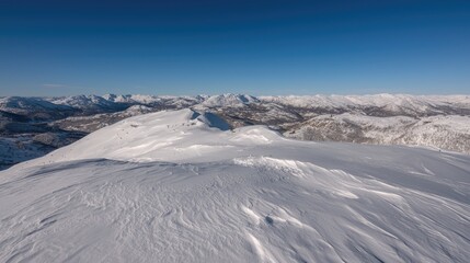 Snowy mountain peak panorama, winter landscape, clear sky, adventure backdrop