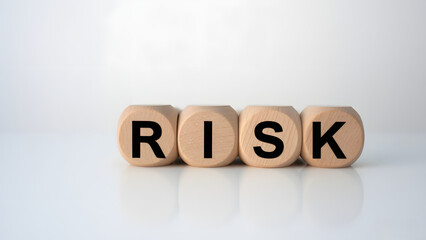 The word RISK is written on wooden blocks, Risk management concept