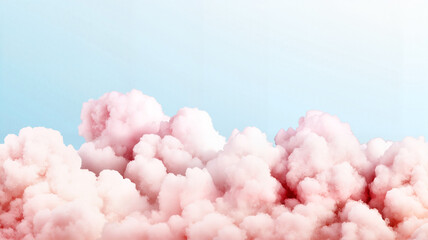 Soft pink clouds against a blue sky, dreamy tranquility