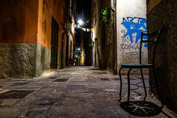 Night view of a carruggio in Genova