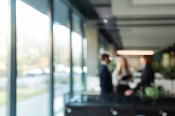Blurred office background with employees