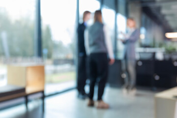 Businessmen blur in the workplace in office with computer or shallow depth of focus of abstract...