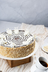 Esterhazy cake, traditional Hungarian, German cake, cake with almonds and condensed milk, walnut cake, cream cake, coffee cake on a light background, flatlay, still life, food photo dessert