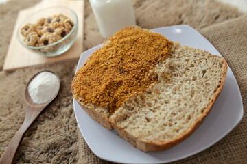 Bread with chicken floss on a plate for breakfast. Homemade bread with dried shredded chicken
