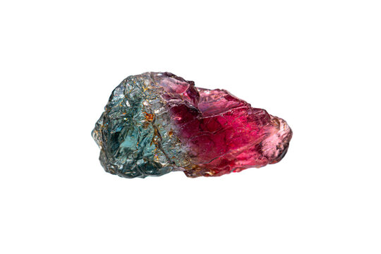 Natural rough bi-color spinel gemstone on white background (selective focus)
