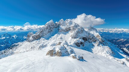 Snowy mountain peak, winter landscape, aerial view, clear sky. Travel brochure, tourism