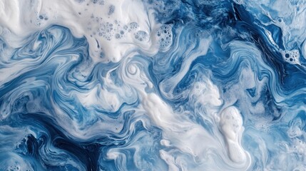 Naklejka premium Swirling patterns on ocean surface showcase deep blues and white foamy textures, illustrating the beauty of marine environments and their intricate designs
