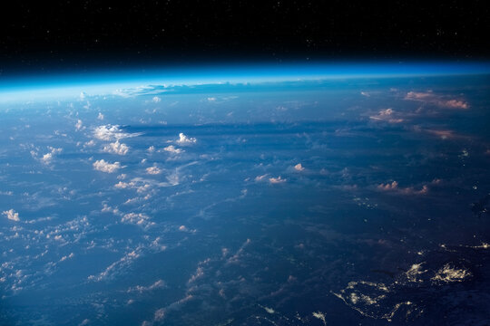 Planet Earth from space. Earth's atmosphere. Observation of the planet Earth from space. On the surface of the planet are visible clouds. Elements of this image furnished by NASA.
