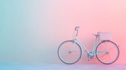 Obraz premium A basket-laden bicycle parked on a soft gradient pink-and-blue background, exuding tranquility